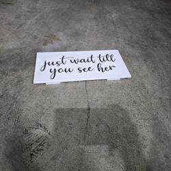 "Just Wait Till You See Her" Sign