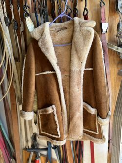 Woman’s Leather And Fur Lined Coat
