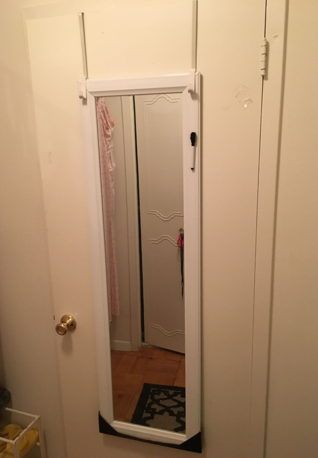 mirror can hanging on the door