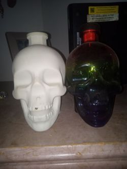 Two glass skulls,$20 cash