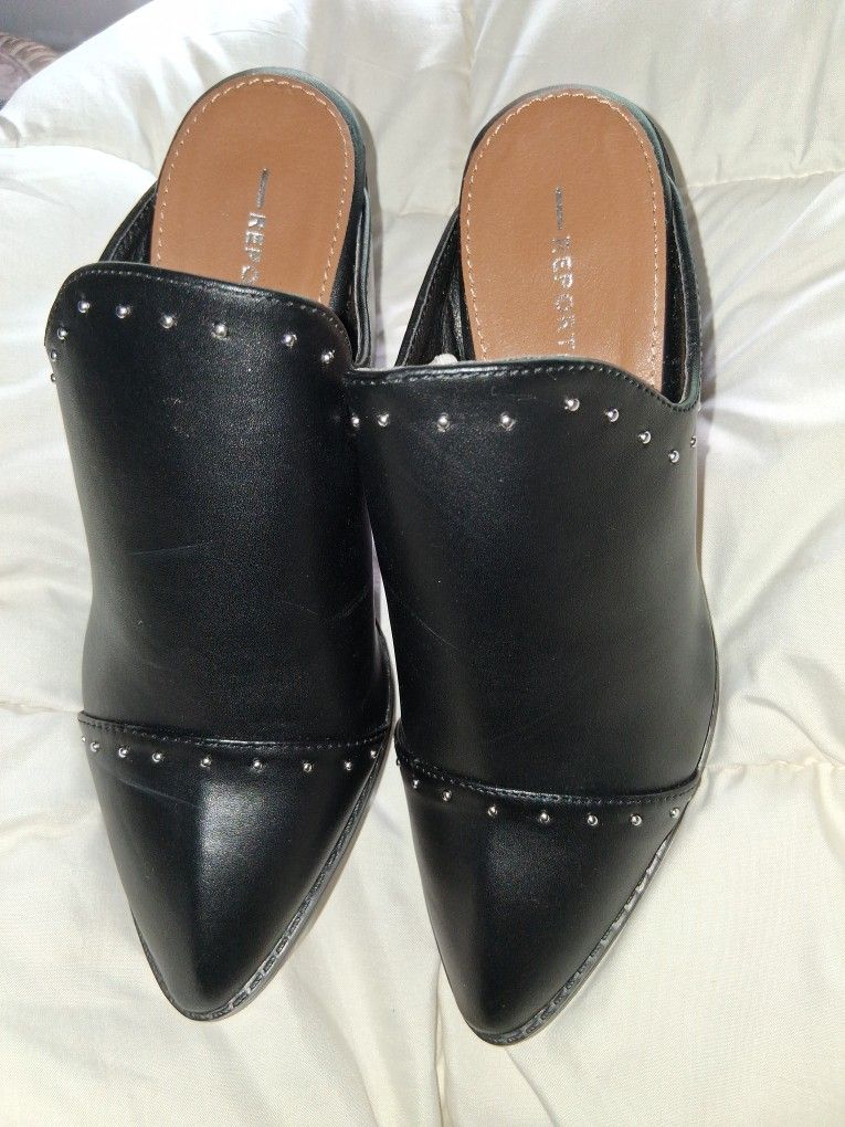 Report ..... Black Leather Mules