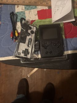 New hand held game system with over 500 games 