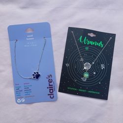 Claire's Silver Paw Mood Necklace and Silver Uranus Necklace