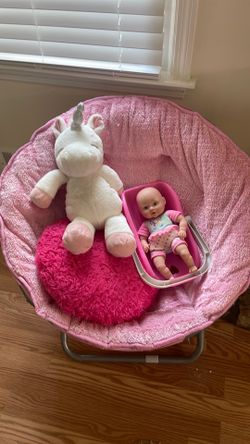 Girl chair with pillow, doll and unicorn