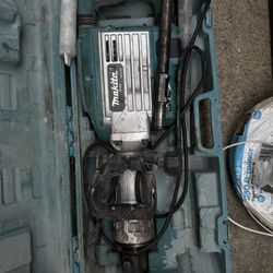Makita demolition hammer (model HM1306).