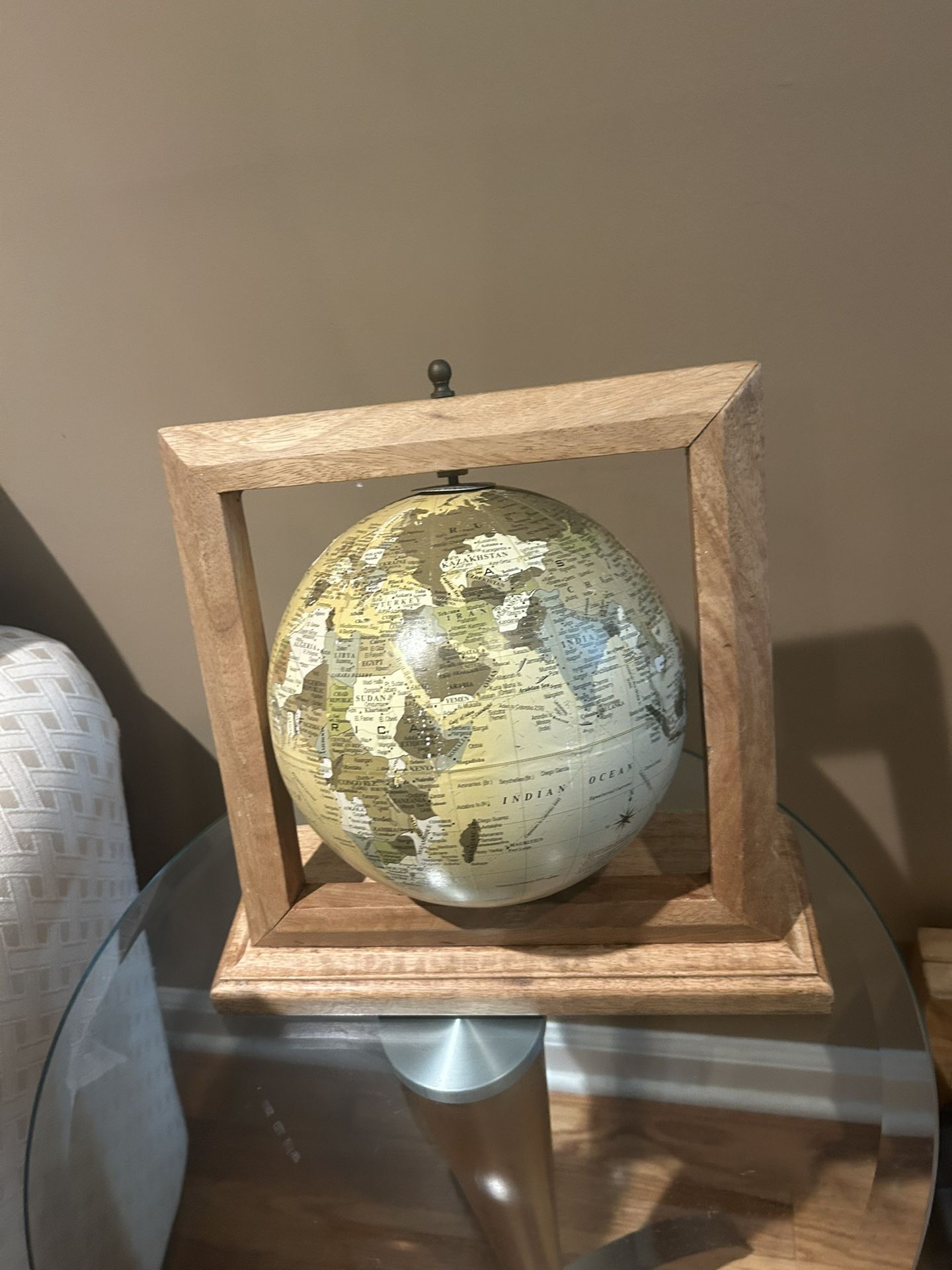 Globe with a wooden stand
