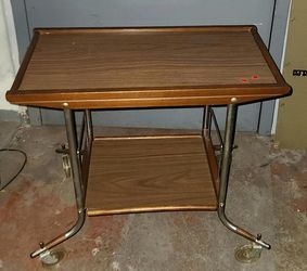 vintage two-tiered mid-century modern serving cart  with wheels