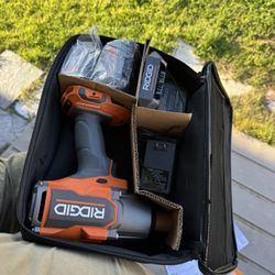 RIDGID 18V Brushless Cordless 4-Mode 1/2 in. High-Torque Impact Wrench Kit with (2) 4.0 Ah Lithium-Ion Batteries and Charger