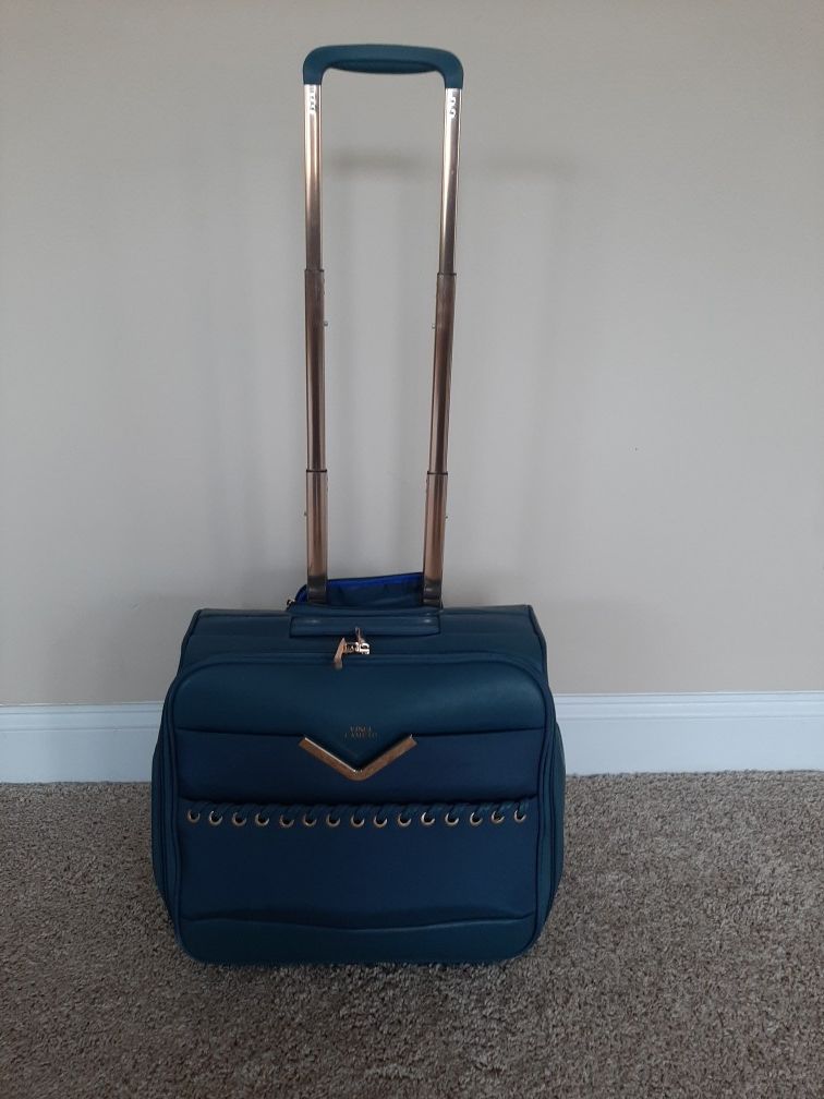 Suitcase carrier on (Vince Camuto)