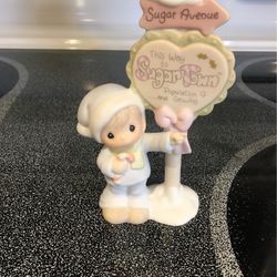 Precious moments/Sugartown/population sign