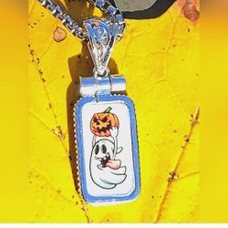 999 Fine Silver Pendant Colorizied Gram Ghost & Pumpkin 🎃 👻 🌟 

White Background With White Ghost and Orange Pumpkin 

1"

Limited Edition Pendant 