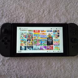 NINTENDO SWITCH (MODDED) with 512GB and 125 SWITCH GAMES 