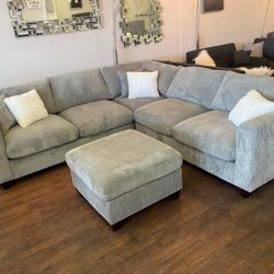Light Gray Sectional & Ottoman 