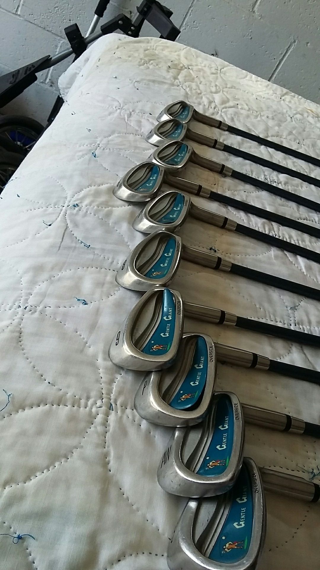 Golf irons. GENTLE GIANT GOLF and bag