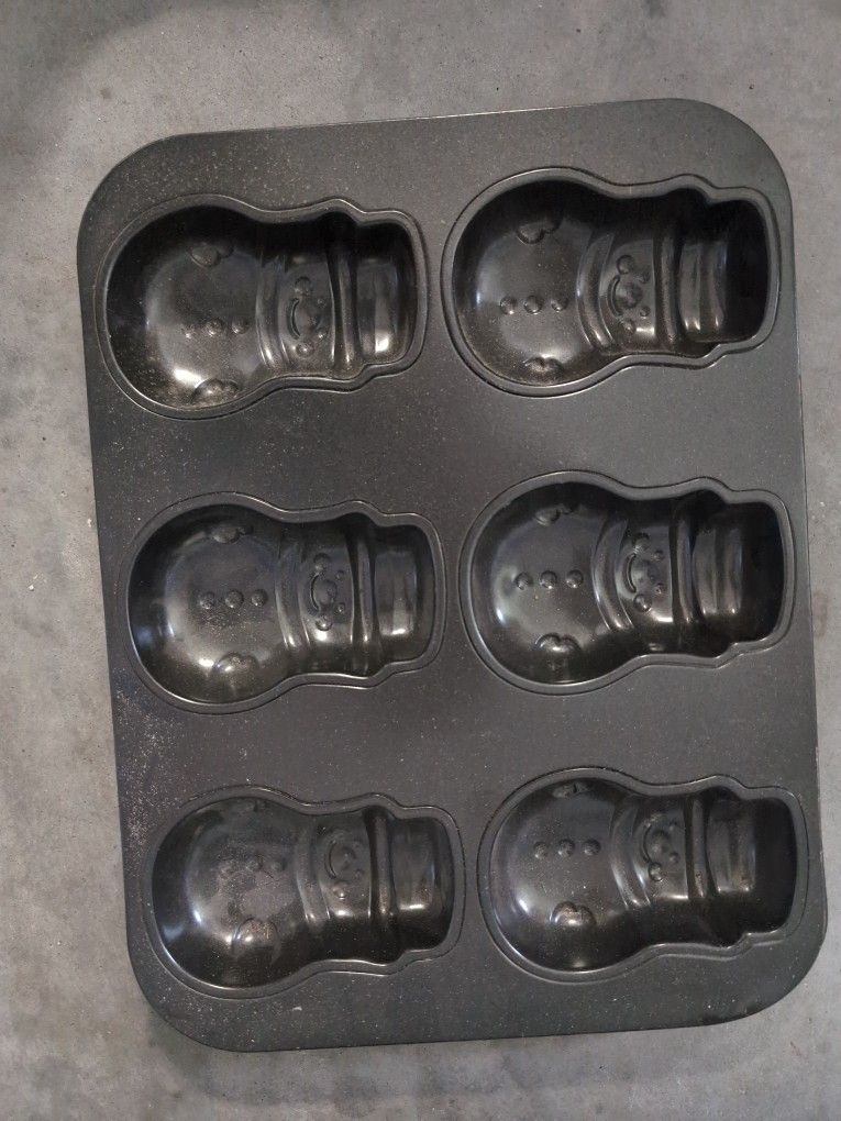 Three Baking Pans One Snowman, Small Bread And Fluted Pans Three