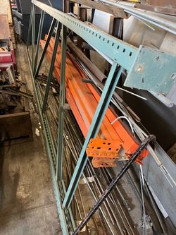 Warehouse rack end upright