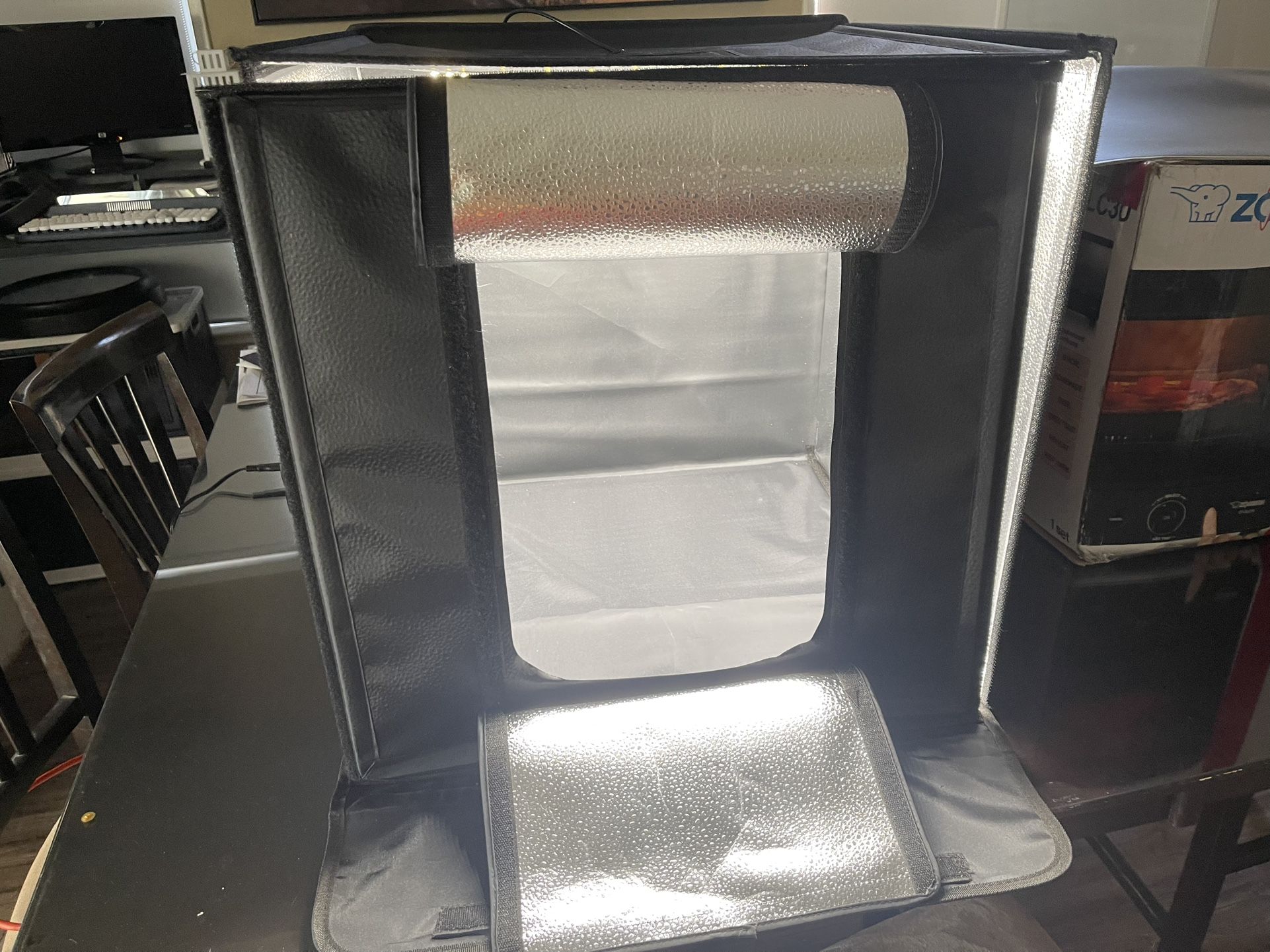 RALENO Portable LED Light Box Photography Studio Kit – Foldable with LED Strips, Backdrops & Power Adapter $50