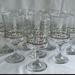 8 vintage Libbey Arby's Christmas Holly Berry water wine goblet with a bow stem and gold rim. 