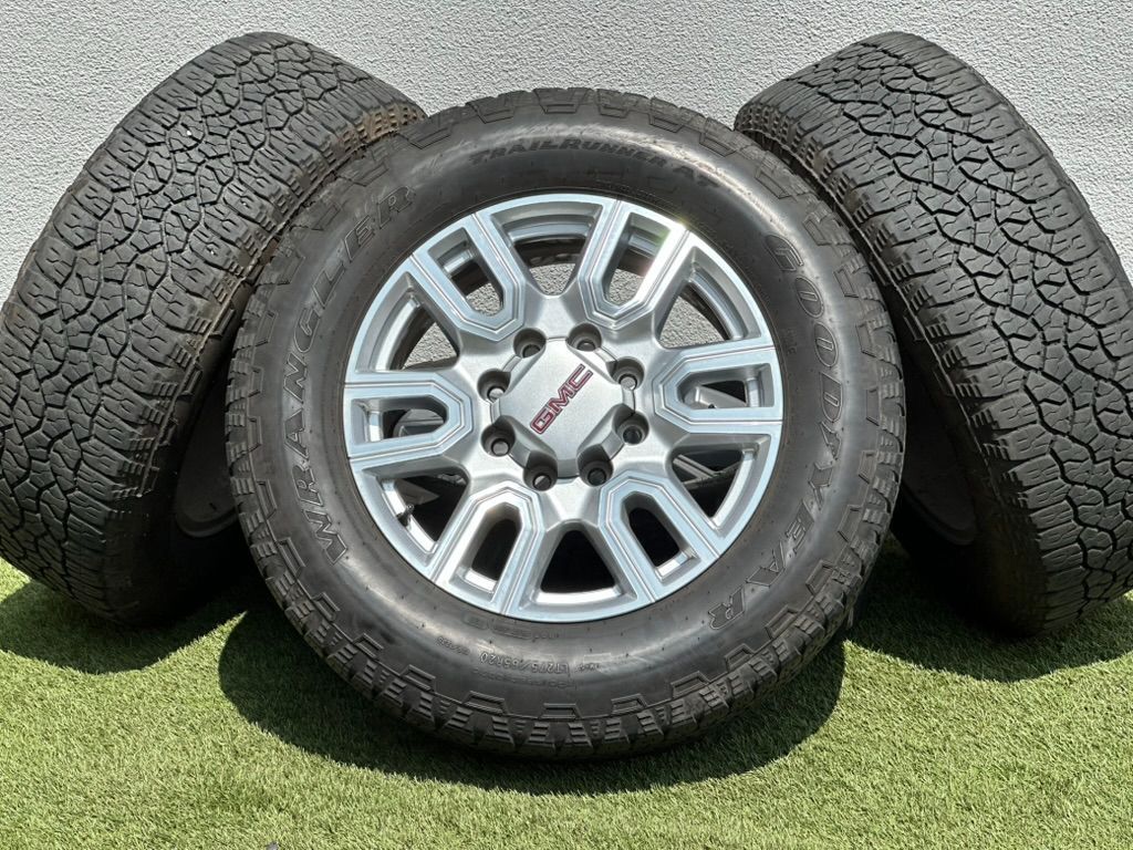 OEM 20” GMC Sierra 3500 Wheels Silver 8x180mm Sierra 2500 rims AT Goodyear tires LT275/65R20