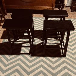 Black wooden stools 