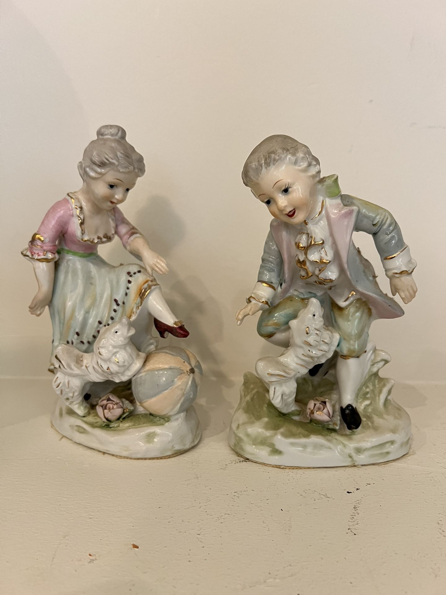 VTG Pair set Colonial Couple Lady Man Figurine Hand Painted Japan Dog Ball Rose These were in my grandmother’s home. I don’t know if she bought them
