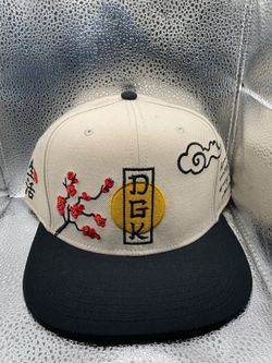 “DGK”  New Snap back off white with Black brim $20