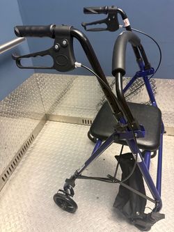 rollator walker o four-wheel walker with a seat.