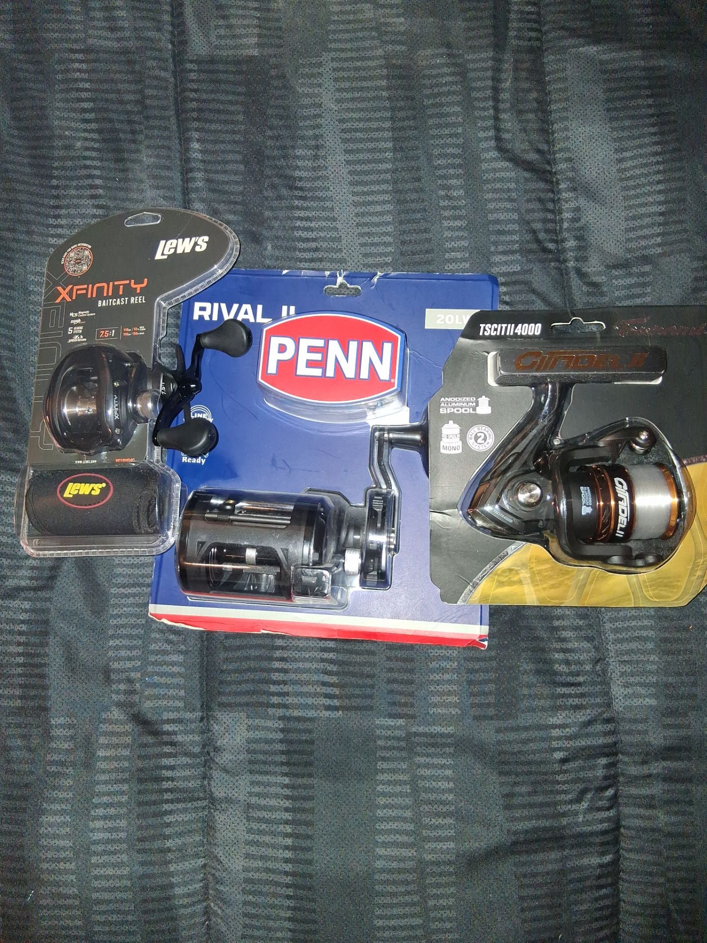 Set of three fishing reels:Lew's Xfinity, Penn Rival 2, Tsunami Citadel ...