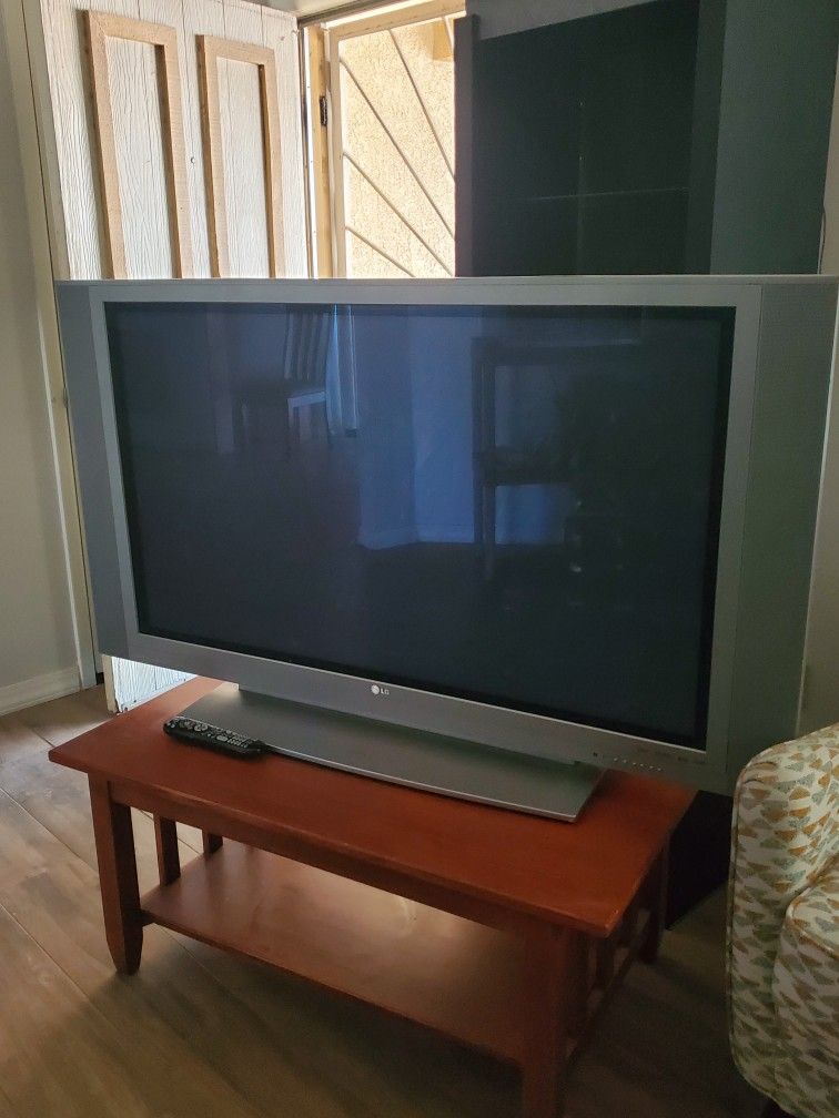 Beautiful 55"Inch Flat Screen LG TV With TV Stand