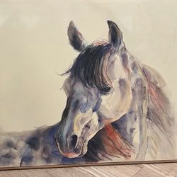 Beautiful horse painting has a 3-D effect because of the paint is raised on some parts of it