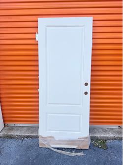 New Woodgrain Impact door slab. This is a white 2-panel door. Actual size is 31-3/4 inches wide by 79-1/4 inches tall. It is a left hand door with dou