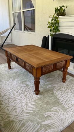 Solid Wood Coffee Table with Woven Rattan Accents