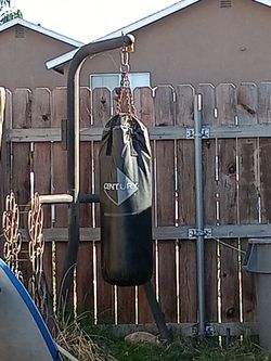 Garage sale my lost your gain. 80 pounds Century Heavy Punching Bag with Stand – Excellent Condition