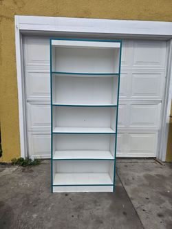 White Bookcase with Teal Trim shelf