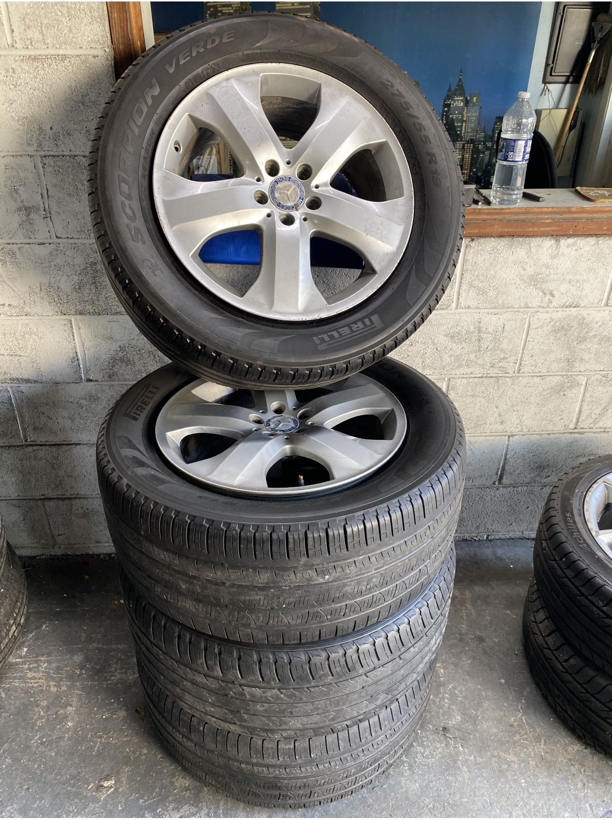 Set of 4 used OEM Mercedes wheels 19 inch and tires 275/55/19 $650 for 4 rims with 4 tires . Plus tax . FINANCING AVAILABLE! Wheel powder coating avai