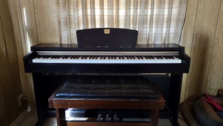 Yamaha Clavinova piano with bench