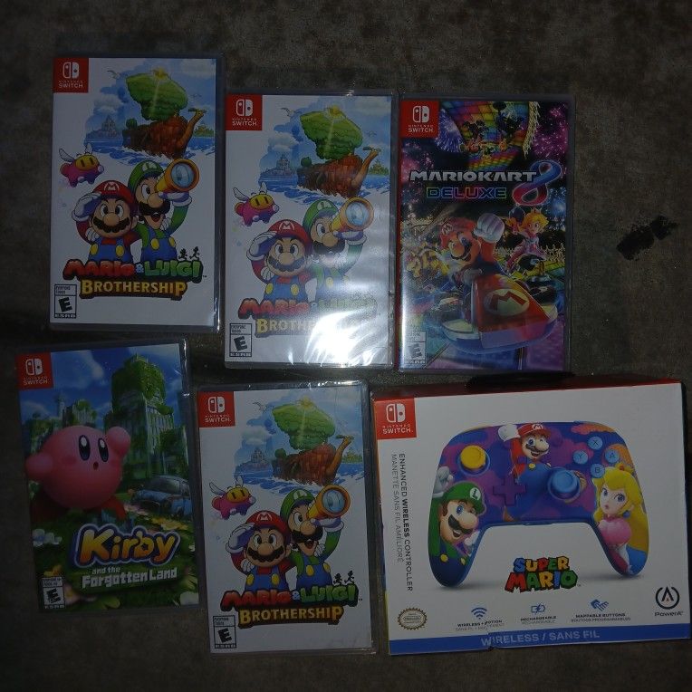 NINTENDO SWITCH GAMES AND CONTROLLER