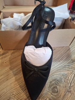 Black kitten heals size 7