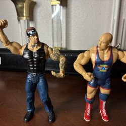 Lot Of 2 JAKKS Pacific 2003 7" Wrestling Action Figure -Kurt Angle Undertaker