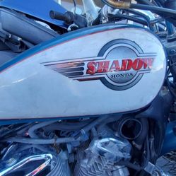 honda shadow 600 cc 3 bikes project or parts as is have only one with title clean for the green need carburetor clean minor work$ 1400 as is  good mot