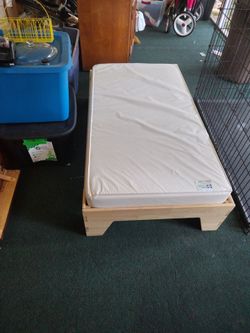 Toddler bed with mattress and cover