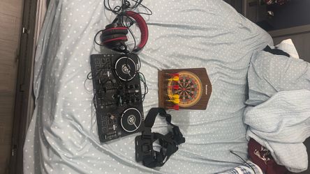 DJ headset; dart board; go pro chest mount; dj set