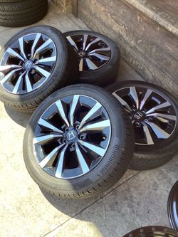 17” HONDA CIVIC FACTORY WHEELS and tires.