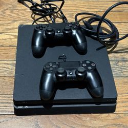 PS4 Slim With Power Chord And HDMI Chord And 2 Controllers 