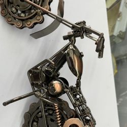 This sleek, handsome motorcross bike is designed by Mexico’s Armando Ramirez. He crafts it by hand with an intriguing assortment of metal pieces, ther