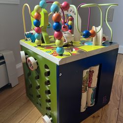 B. Toys Wooden Activity Cube - Zane’s zoo
