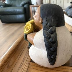 Native Woman With Yellow Flowers