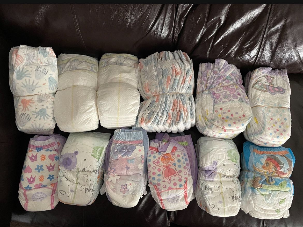 New Diapers And Training Pants, Size 5-6, around 70-80 total $25 for all