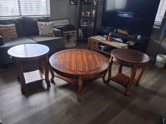 Brown wooden coffee w/ 2 end tables