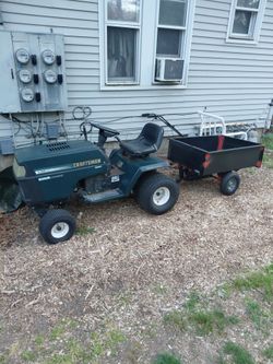 Mower cart and a four stroke Craftsman weed Wacker.